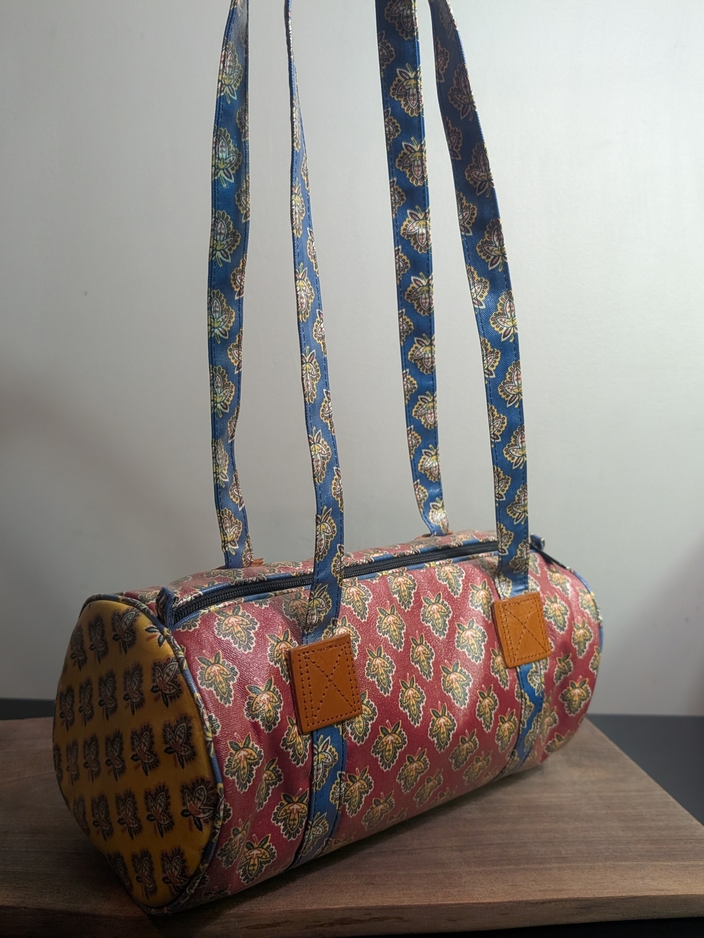 Floral Barrel Shoulder Bag in Red, Blue, and Yellow Mini Duffle Bag